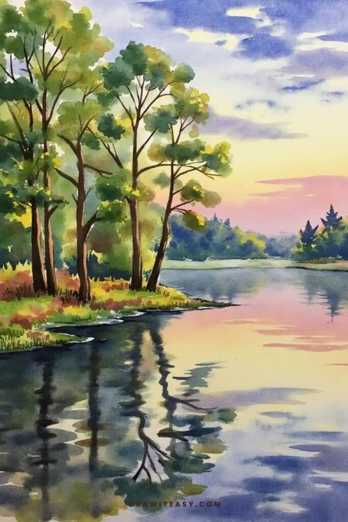 Sunset over a calm lake with reflections of trees